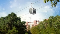 Eine Seilbahn-Gondel vor dem Karl-Marx-Hof: Die Trasse der rund 5,6 Kilometer langen Kabinenbahn ...