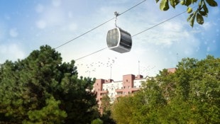 Eine Seilbahn-Gondel vor dem Karl-Marx-Hof: Die Trasse der rund 5,6 Kilometer langen Kabinenbahn ...
