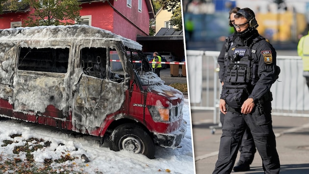 A completely burnt-out bus stands at the scene, with a carpet of extinguishing foam in front of ...