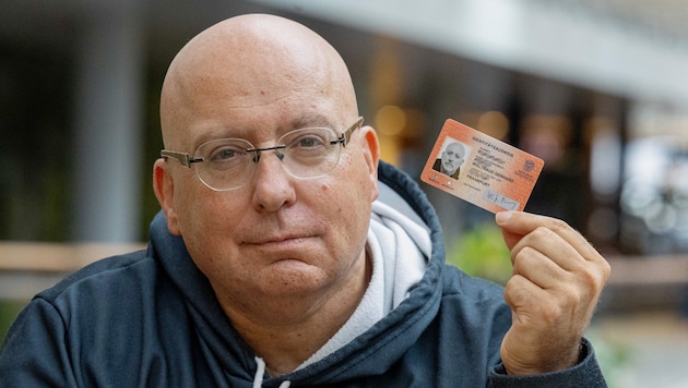 Waltraud still had a moustache on her ID photo.
