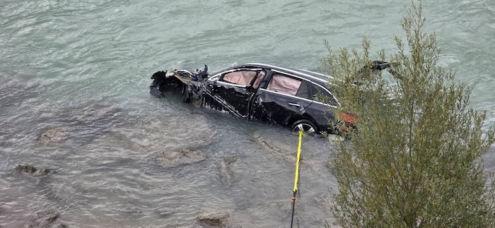 The car got stuck about five meters from the bank.