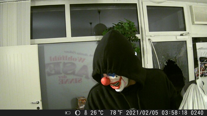 The horror clown was photographed during the robbery and is now on television.