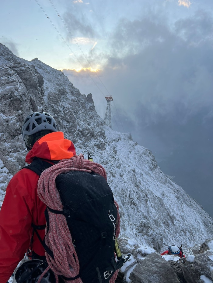 Mountain rescuers and alpinists had to climb into the gondola via one of the cable car's mighty ...