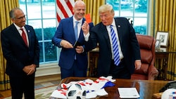 Donald Trump (re.) gemeinsam mit Gianni Infantino (Mitte)