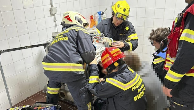 The fire department dismantled the dryer to create space for the rescue.