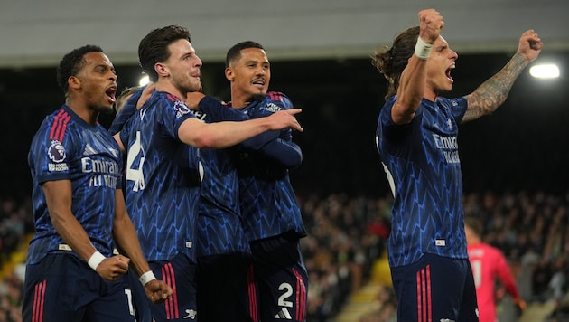 The jubilation of the Arsenal players