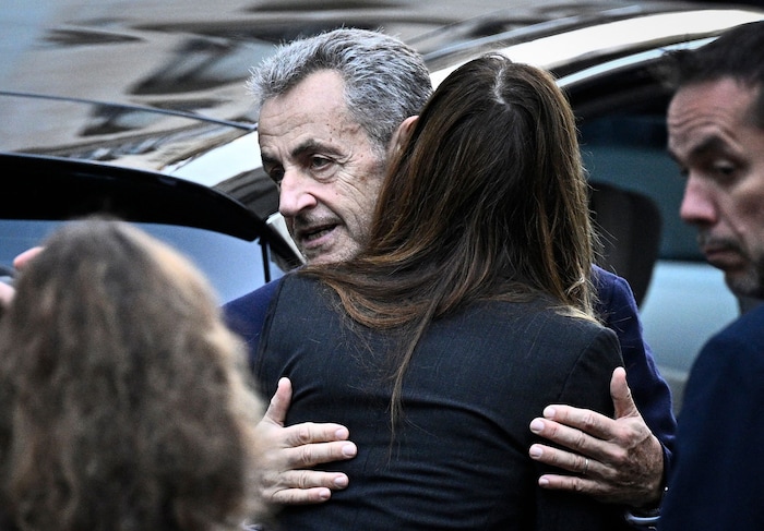 A hug before entering prison