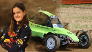 Sophie gibt erfolgreich in einem giftgrünen Buggy Vollgas.