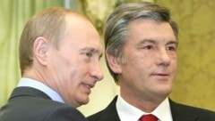 Sieht schwere Zeiten auf Wladimir Putin zukommen: Viktor Juschtschenko (re.) hofft auf das Ende ...