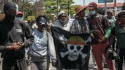 Demo in Madagaskar: Der Totenkopf mit dem Hut der Freiheit wurde durch soziale Netzwerke zum ...