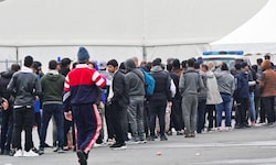 Migranten in Spielfeld