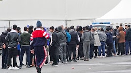 Migranten in Spielfeld