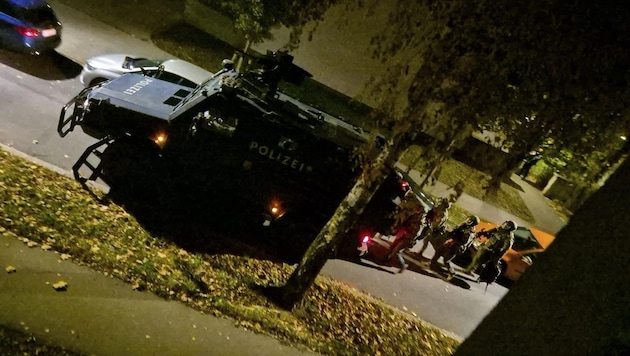 The police arrived with armored vehicles.