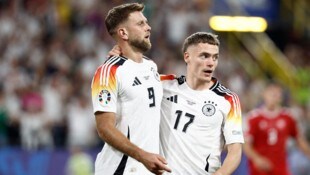 Niclas Füllkrug (l.) will West Ham United verlassen.