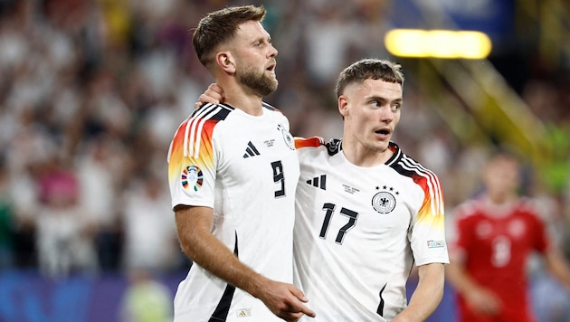 Niclas Füllkrug (l.) will West Ham United verlassen.