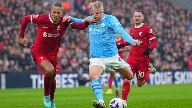 Liverpool-Routinier Virgil Van Dijk (l.).