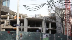 Vier Geschoße geplante Kaufhausfläche sind weg, um Platz für sieben neue Geschoße mit Wohnungen ...