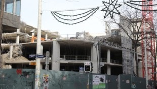 Vier Geschoße geplante Kaufhausfläche sind weg, um Platz für sieben neue Geschoße mit Wohnungen ...