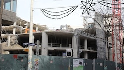 Vier Geschoße geplante Kaufhausfläche sind weg, um Platz für sieben neue Geschoße mit Wohnungen ...