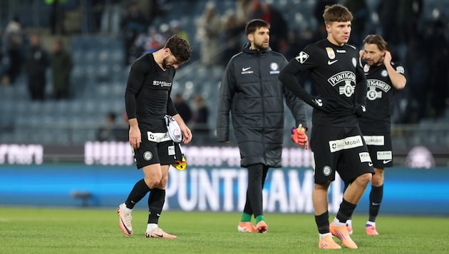 Hängende Köpfe bei Sturm