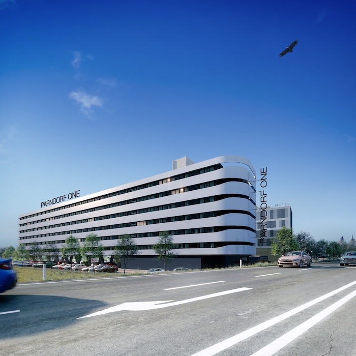 Lange Fensterbänder sollen trotz kleineren Zimmern Weite bringen. Das Hotel wird auf Stützen ...