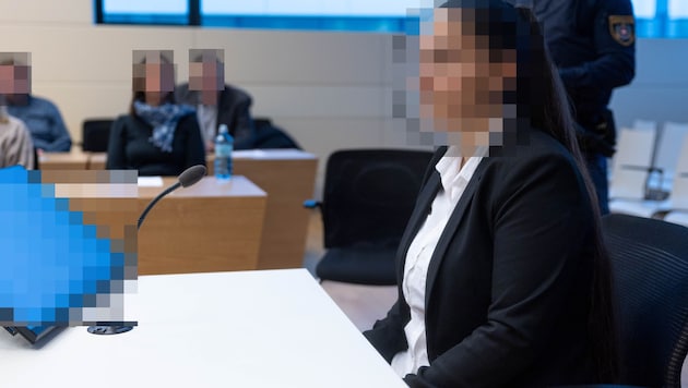 The 33-year-old says one sentence at the re-enactment: "I'm sorry."