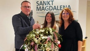 Beim verkehrten Weihnachtsmarkt in Sankt Magdalena – im Bild das Organisationsteam Günther ...