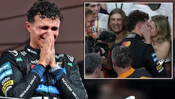 Tränen der Freude und Erleichterung bei Lando Norris. Seine Freundin und seine Familie freuen ...