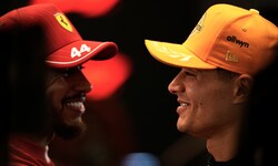 Lewis Hamilton (l.) sprach vor dem WM-Finale mit Lando Norris (r.).