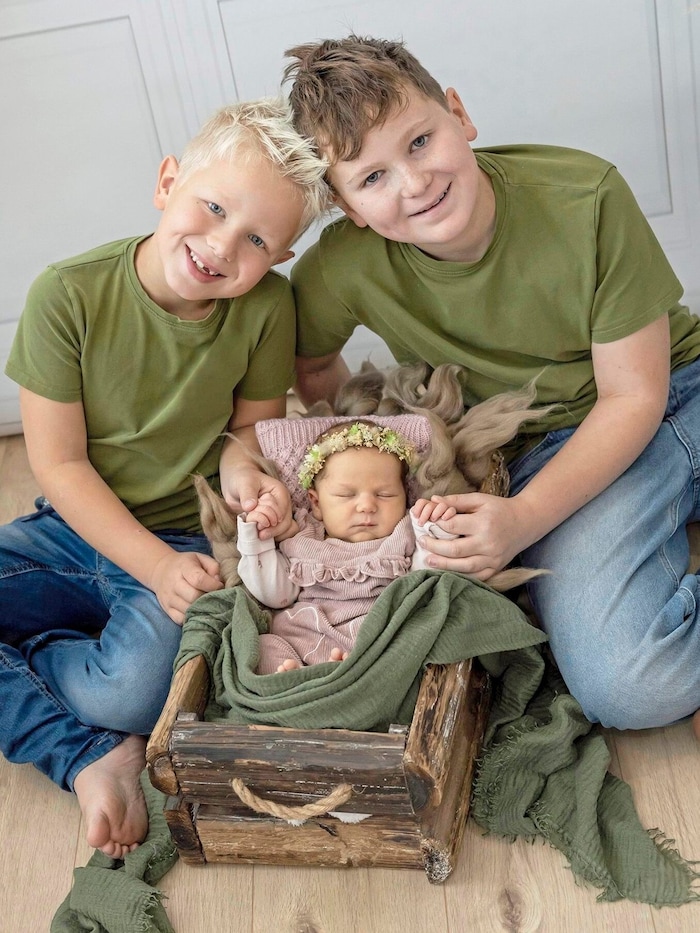 Raphael and Michael are very happy about baby Isabella