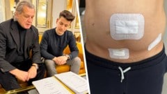 Topanwalt Dr. Boran mit seinem Klienten. Die Narben werden nie ganz weggehen.