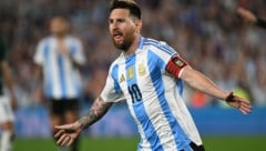 Lionel Messi und seine Kameraden auf dem Grünen Rasen werden mit dem Wirbel im ...