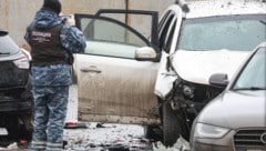 Ermittler am Tatort in Moskau, wo ein russischer General getötet wurde: Ein Anschlag durch ...