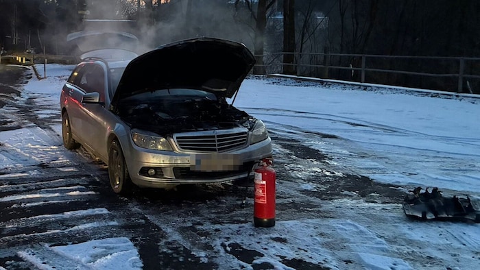 The Mercedes caught fire while I was driving.