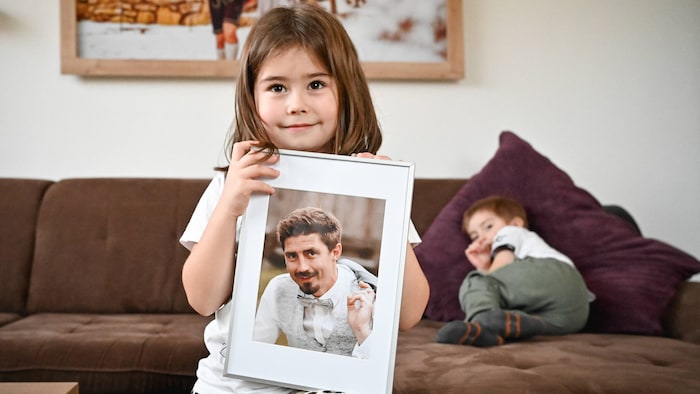 Valerie with a picture of her late dad