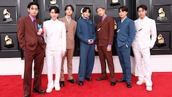 Die Mitglieder von BTS: V, Suga, Jin, Jungkook, RM, Jimin und J-Hope bei einem ihrer letzten ...