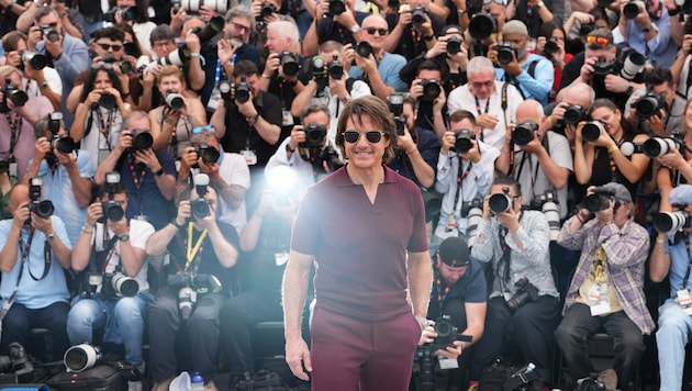 Blitzlichtgewitter bei den Filmfestspielen im französischen Cannes 2025 als Hollywood-Star Tom ...