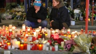 Kerzen und Trauer in Crans Montana