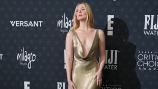 Elle Fanning zog in ihrer goldenen Robe alle Blicke auf sich.