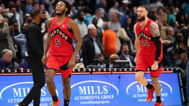 Immanuel Quickley (li.) ließ die Raptors jubeln.