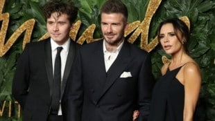 Ein Foto aus besseren Tagen: Brooklyn Beckham mit seinen Eltern David und Victoria Beckham. ...
