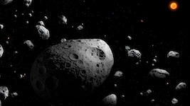 Diese künstlerische Darstellung zeigt den Asteroiden 2025 MN45 (Bildmitte), umgeben von vielen ...