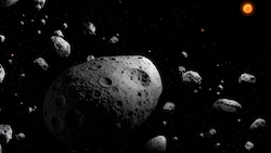 Diese künstlerische Darstellung zeigt den Asteroiden 2025 MN45 (Bildmitte), umgeben von vielen ...