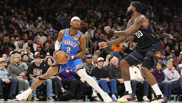 Shai Gilgeous-Alexander (l.)