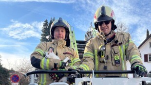 Die beiden Retter des kleinen Kätzchens.