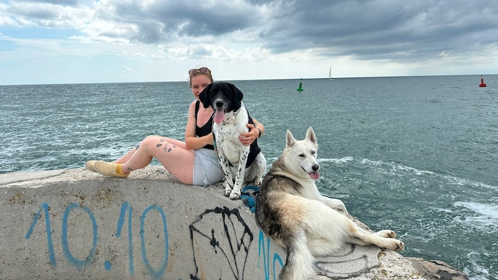 Bailey, pictured here with her doggy friend and Alina P. on vacation, was the beloved center of ...