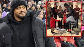 Vincent Kompany mit einem kleinen Fan im Tauschgeschäft.