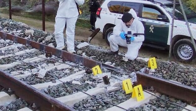 A break in the tracks may have caused the carriages to jump off the rails and end up on the ...