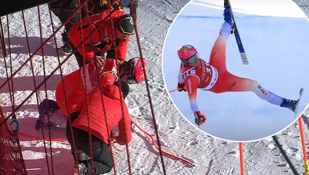 In der Luft wirft es Boisset die Beine in die Höhe, dann knallt er auf die harte Piste!