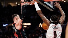 Sandro Mamukelashvili (li.)